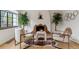 Charming living room featuring a decorative fireplace, hardwood floors, and comfortable seating at 1275 Birch St, Denver, CO 80220