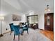 Cozy living room with high ceilings, ample natural light, and comfortable seating at 6343 Laguna Cir, Highlands Ranch, CO 80130