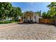 Charming home with stone landscaping, a well-maintained yard, and a welcoming exterior at 4450 S Fox St, Englewood, CO 80110