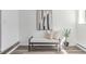 Hallway features stylish decor and a sleek bench, creating a welcoming space at 4450 S Fox St, Englewood, CO 80110