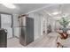 Streamlined kitchen and living area showcasing modern appliances and an open-concept layout at 4450 S Fox St, Englewood, CO 80110