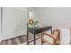 Well-lit office with sleek desk, a chair, and sliding closet doors, great for productivity at 4450 S Fox St, Englewood, CO 80110