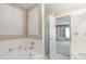 Bright bathroom features a soaking tub and is accessible from the main bedroom at 1283 W 112Th Ave # B, Denver, CO 80234