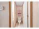 Cozy half-bathroom featuring a toilet, small cabinet, and neutral-toned walls at 1283 W 112Th Ave # B, Denver, CO 80234