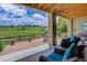 Relax on this covered patio overlooking the golf course at 11208 W Ontario Ave, Littleton, CO 80127