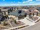 Expansive aerial view of a home with solar panels in a well-developed neighborhood at 8023 Gore Creek Ln, Littleton, CO 80125