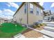 Backyard exterior featuring a putting green and landscaping at 8023 Gore Creek Ln, Littleton, CO 80125