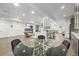 Finished basement with a fireplace, kitchenette, bar seating, and an open layout ideal for relaxation and social gatherings at 8023 Gore Creek Ln, Littleton, CO 80125