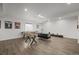 Finished basement featuring games, seating, sports memorabilia, and entertainment, designed for relaxation and recreation at 8023 Gore Creek Ln, Littleton, CO 80125