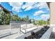 Relaxing outdoor patio with comfortable seating area and fire pit feature at 8023 Gore Creek Ln, Littleton, CO 80125