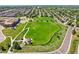 Expansive neighborhood park offering various amenities, including a playground, walking paths, and green spaces at 13660 Monroe St, Thornton, CO 80602