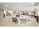 Expansive basement featuring a seating area, wet bar, nook and staircase at 1104 Brocade Dr, Littleton, CO 80126