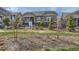 Attractive one-story home with well-maintained landscaping and a real estate sign displayed at 1104 Brocade Dr, Littleton, CO 80126