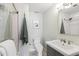 Updated bathroom featuring a subway tile shower, modern vanity, and fresh decor at 1401 N Franklin St # 2, Denver, CO 80218