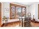 Bright breakfast nook features a high-top table and a view of outside from the window at 1401 N Franklin St # 2, Denver, CO 80218