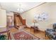 Stately foyer with hardwood floors, staircase, and decorative rug at 1401 N Franklin St # 2, Denver, CO 80218