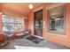 Inviting front porch with seating and a secure gate at 1401 N Franklin St # 2, Denver, CO 80218