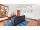 Well-lit living room with hardwood floors, a comfortable couch, and a view from the windows at 1401 N Franklin St # 2, Denver, CO 80218