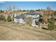 Aerial view of house, deck, and expansive lot at 16521 E Easter Way, Foxfield, CO 80016