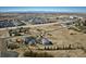 Wide angle aerial view showing house and surrounding area at 16521 E Easter Way, Foxfield, CO 80016