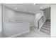 Basement bar with marble backsplash and modern cabinetry at 16521 E Easter Way, Foxfield, CO 80016