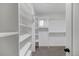 Spacious walk-in closet with ample shelving and hanging space at 16521 E Easter Way, Foxfield, CO 80016