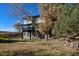 House exterior with deck and landscaping at 16521 E Easter Way, Foxfield, CO 80016