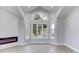 Bright living room featuring a vaulted ceiling and large windows at 16521 E Easter Way, Foxfield, CO 80016