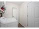 Bright laundry room features new washer and dryer and white cabinets at 10411 Dowdle Dr, Golden, CO 80403