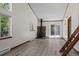Living room with wood-burning stove, sliding glass doors, and neutral color palette at 10411 Dowdle Dr, Golden, CO 80403