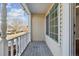 Charming front porch offers a relaxing outdoor space with street view at 15614 E 51St Pl, Denver, CO 80239