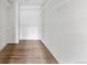 Empty walk-in closet with ample shelving, providing organized storage space in a well-lit area at 2500 Van Gordon St, Lakewood, CO 80215