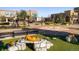Southlands outdoor center featuring public art, seating, and well-maintained landscaping at 6302 S Jackson Gap Ct, Aurora, CO 80016