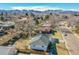 Aerial view of the property, showcasing its location in a neighborhood with mountain views at 10930 W Tulane Ave, Littleton, CO 80127