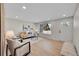 Inviting living room with comfortable seating, large window, and modern finishes creating a cozy atmosphere at 10930 W Tulane Ave, Littleton, CO 80127