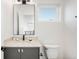 Stylish bathroom features a modern vanity, sleek fixtures, and a clean design for a refreshing experience at 4227 Mariposa St, Denver, CO 80211