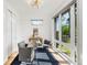 Bright home office with large windows, providing ample natural light at 4227 Mariposa St, Denver, CO 80211
