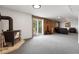 Finished basement features a wood-burning stove and sliding glass door at 11724 Little Turtle Ln, Conifer, CO 80433