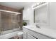 Bathroom featuring a shower with glass door and white vanity at 11724 Little Turtle Ln, Conifer, CO 80433