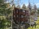 Exterior view of multi-story home with multiple balconies at 11724 Little Turtle Ln, Conifer, CO 80433
