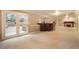 Basement space features a wet bar, fireplace, and access to the outside patio at 10 Long Bow Cir, Monument, CO 80132