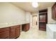 Large basement with granite countertops, under cabinet storage and door leading to an ensuite bathroom at 10 Long Bow Cir, Monument, CO 80132