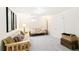 Basement featuring carpet and a futon couch at 7970 S Cook Way, Centennial, CO 80122