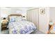 Bedroom with a twin bed and decorative floral bedding at 7970 S Cook Way, Centennial, CO 80122