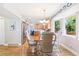 Cozy dining area adjacent to kitchen featuring bay window at 7970 S Cook Way, Centennial, CO 80122