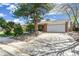 Charming home with a lush lawn, mature trees, and inviting curb appeal at 7970 S Cook Way, Centennial, CO 80122