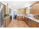 Open kitchen with stainless steel appliances and ample counter space at 7970 S Cook Way, Centennial, CO 80122