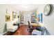 Bright office features hardwood flooring and natural light at 7970 S Cook Way, Centennial, CO 80122