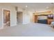Spacious basement with carpet floors, recessed lighting, and an adjoining bathroom at 860 Bramblewood Dr, Castle Pines, CO 80108