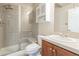 Bathroom showcasing a glass-enclosed shower, tile, and a vanity with a mirror at 860 Bramblewood Dr, Castle Pines, CO 80108